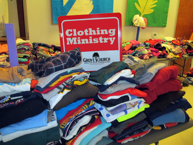 piles of clothes for clothing ministry sale