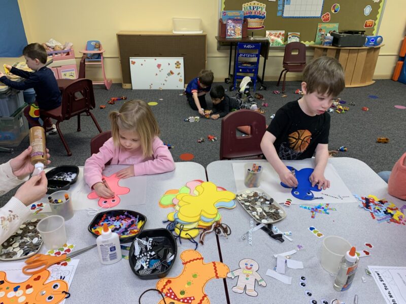 preschool children at table doing projects