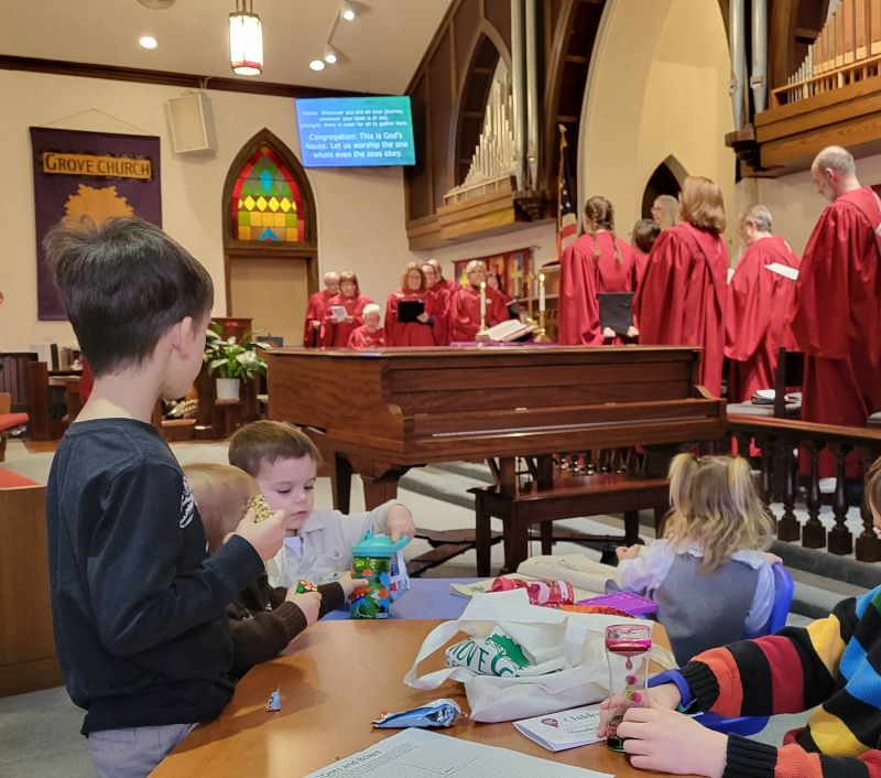 children in the sanctuary during worship service